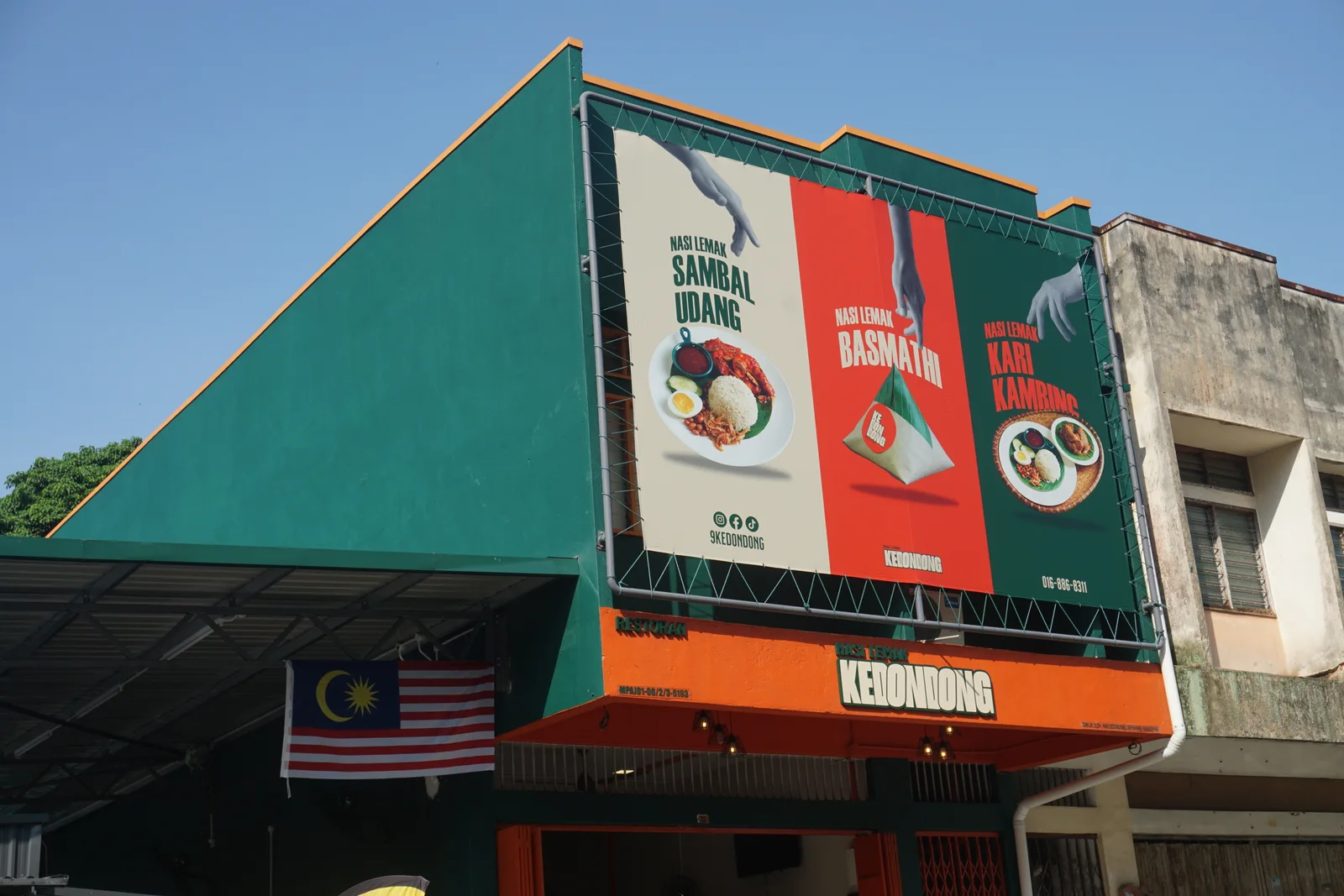 Kedondong restaurant facade with green and orange brand signage